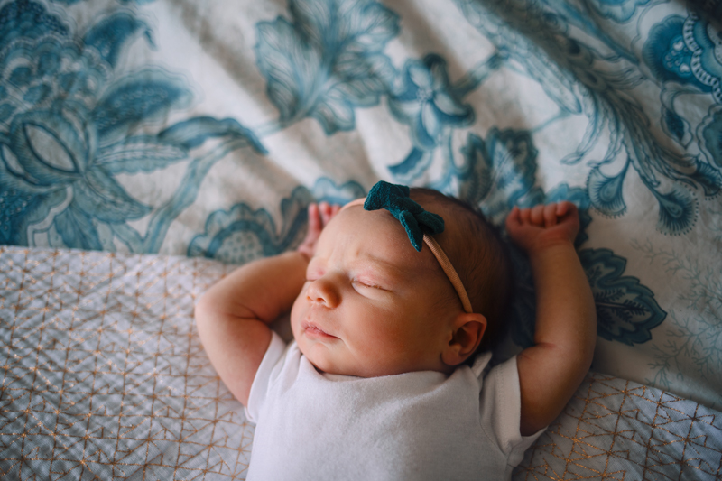 Temecula Newborn Photographer, close up of newborn baby girl with blue headband