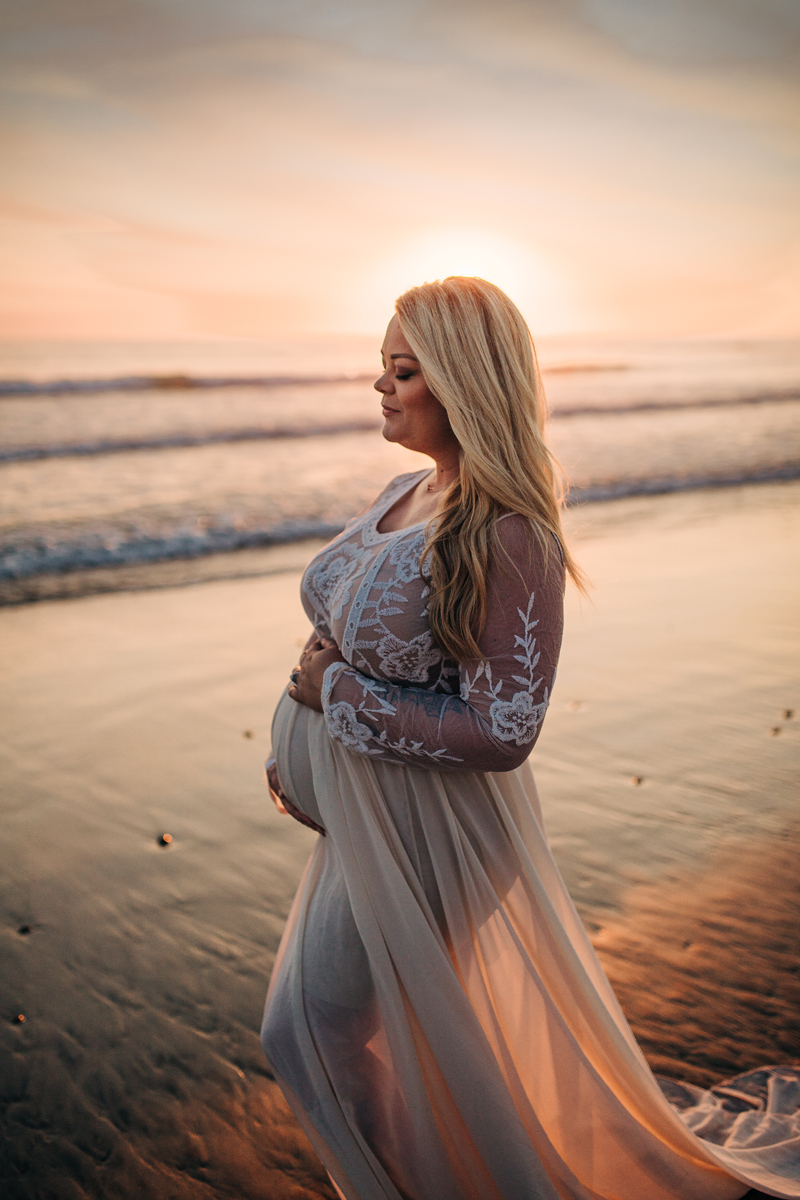 Temecula Maternity Photographer, woman standing at the beach during sunset