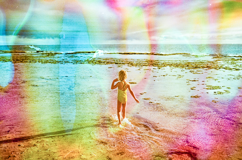 Beach photo of little girl with film soup shot on Fuji 200